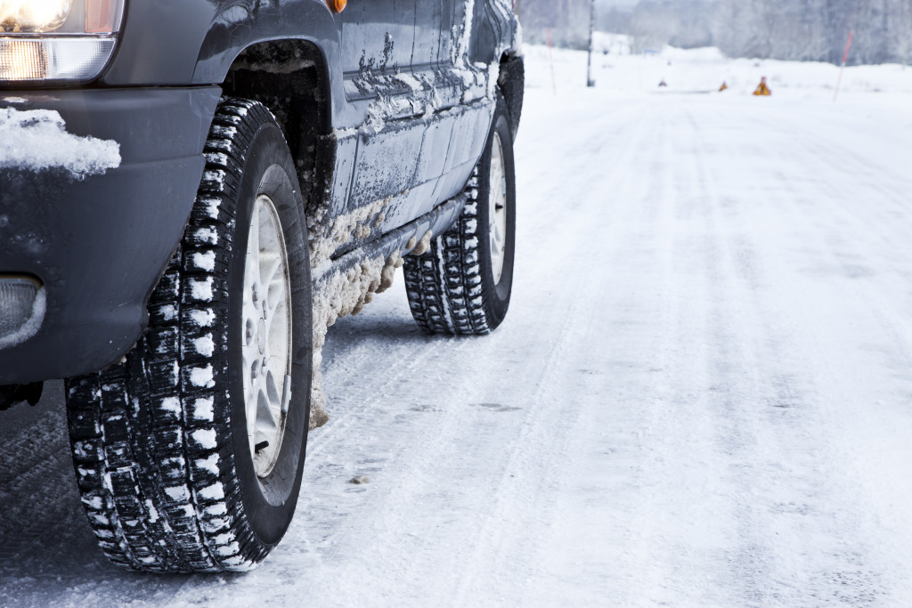 cars tires on a snowy road
