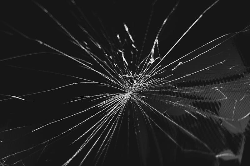 a spiderweb crack on glass